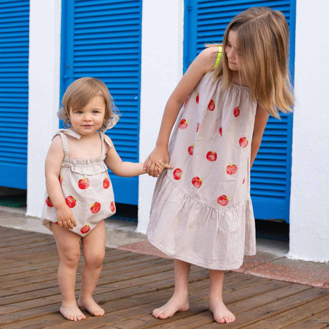 Girl dress tomatoes